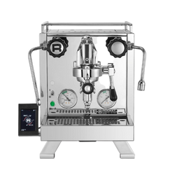 A silver Rocket Espresso Cinquantotto espresso machine with dual boilers, a touch screen communication pod, and a brass grouphead.